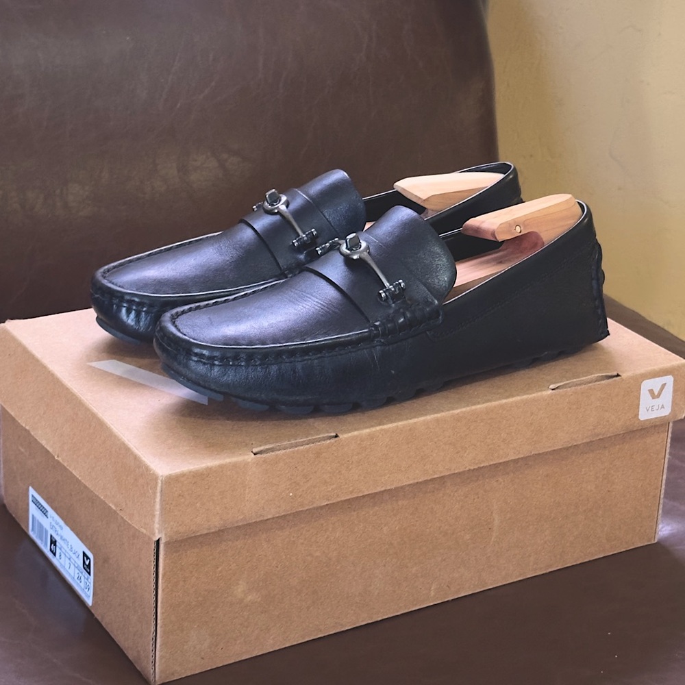 Coach Men penny loafers.